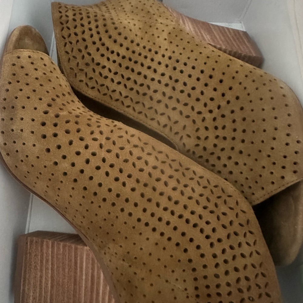 Women's Tan Perforated Suede Shoes.  They fit more like a size 7.